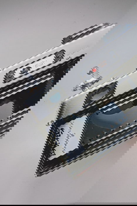 An image of a roll of 35mm film loaded in an analog camera